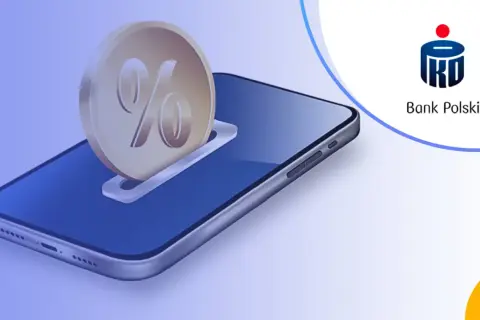 Grafika przedstawia monetę z symbolem procentu wsuwaną do slotu w smartfonie.