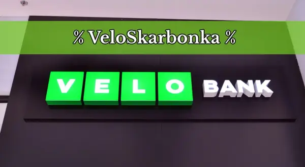 Logo VeloSkarbonka i napis BANK na ciemnym tle.